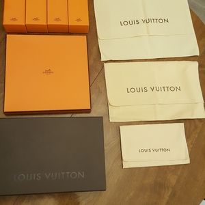 Shopping bags, dust bags and boxes all together